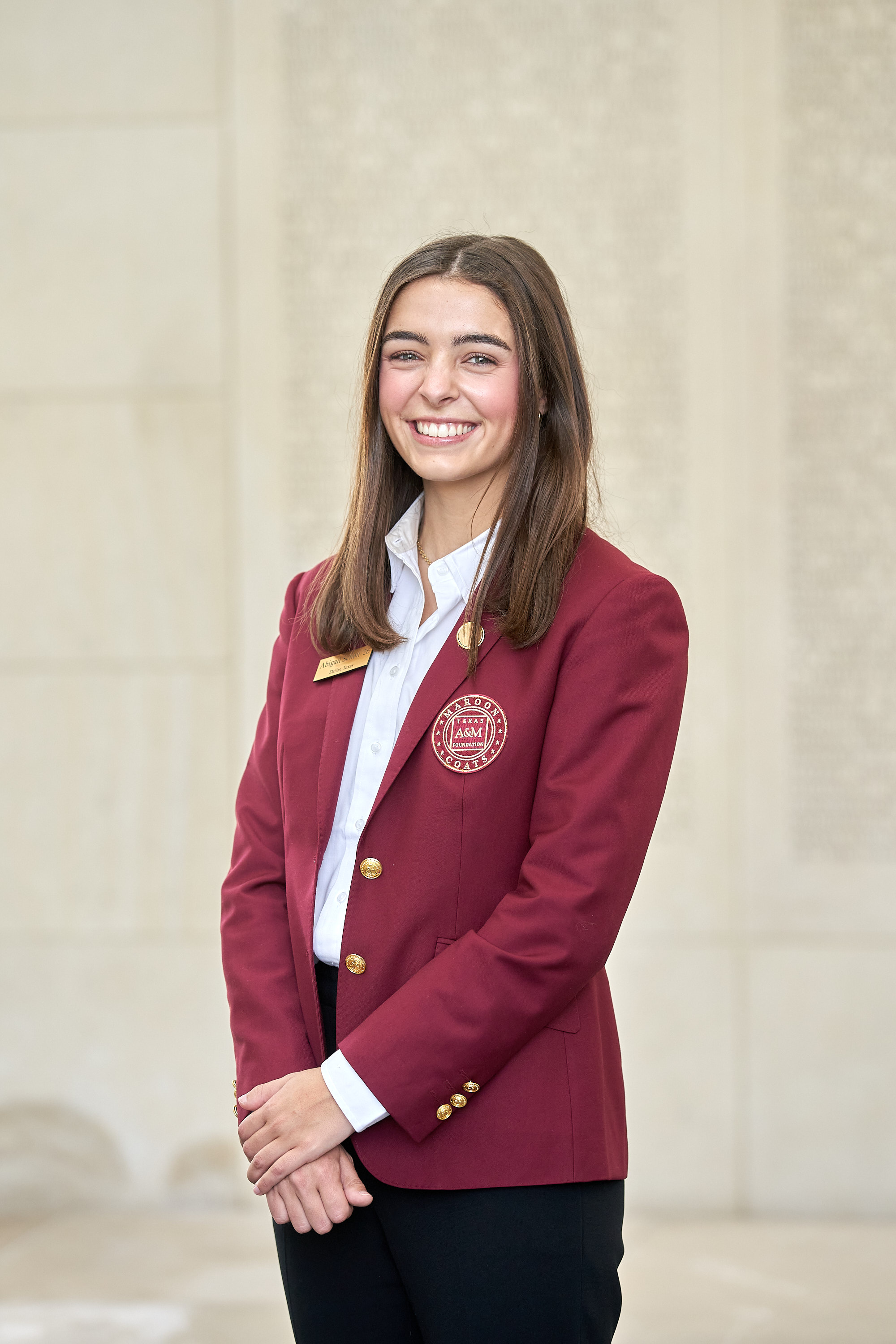 Maroon coat staff image