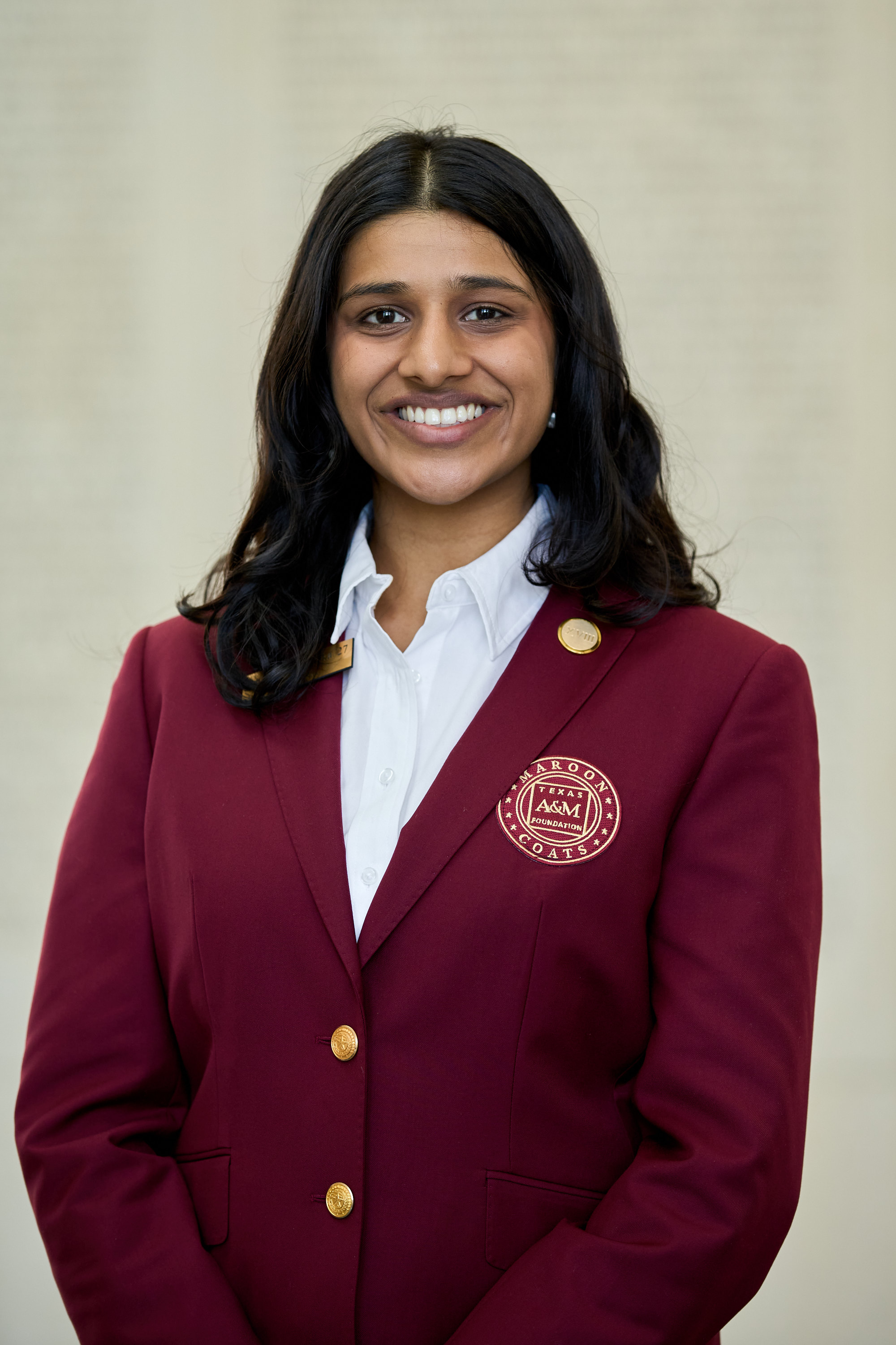 Maroon coat staff image