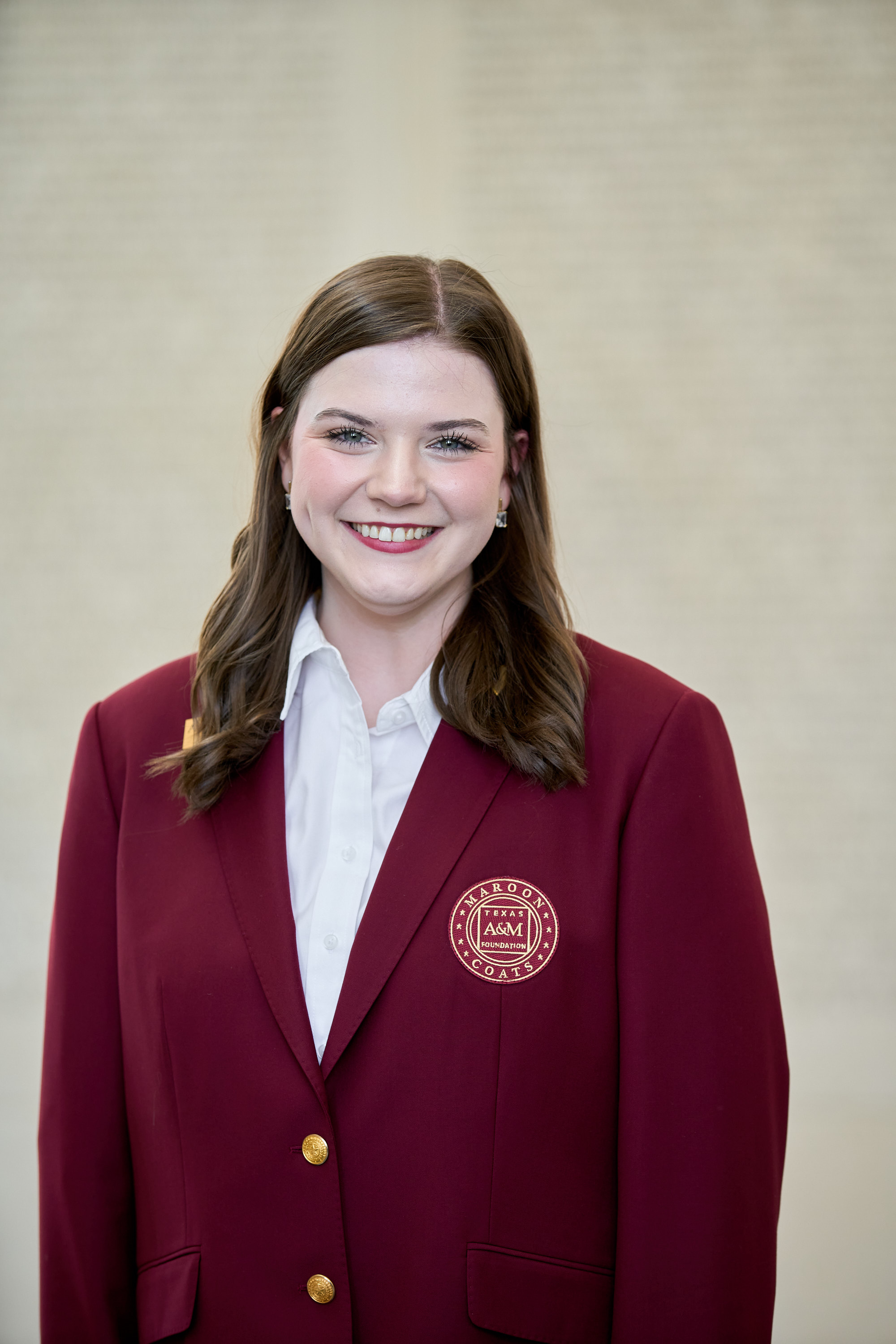 Maroon coat staff image