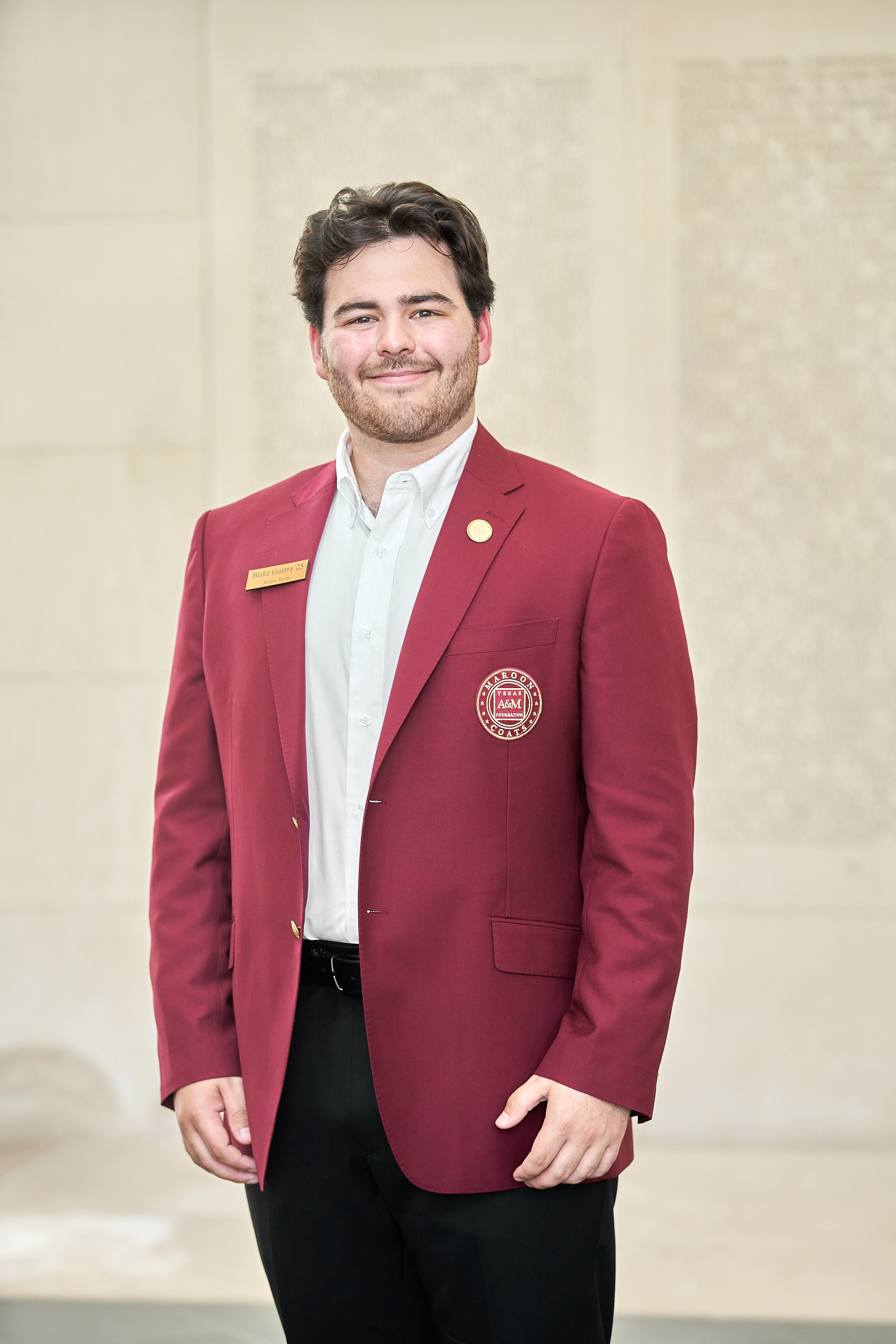 Maroon coat staff image
