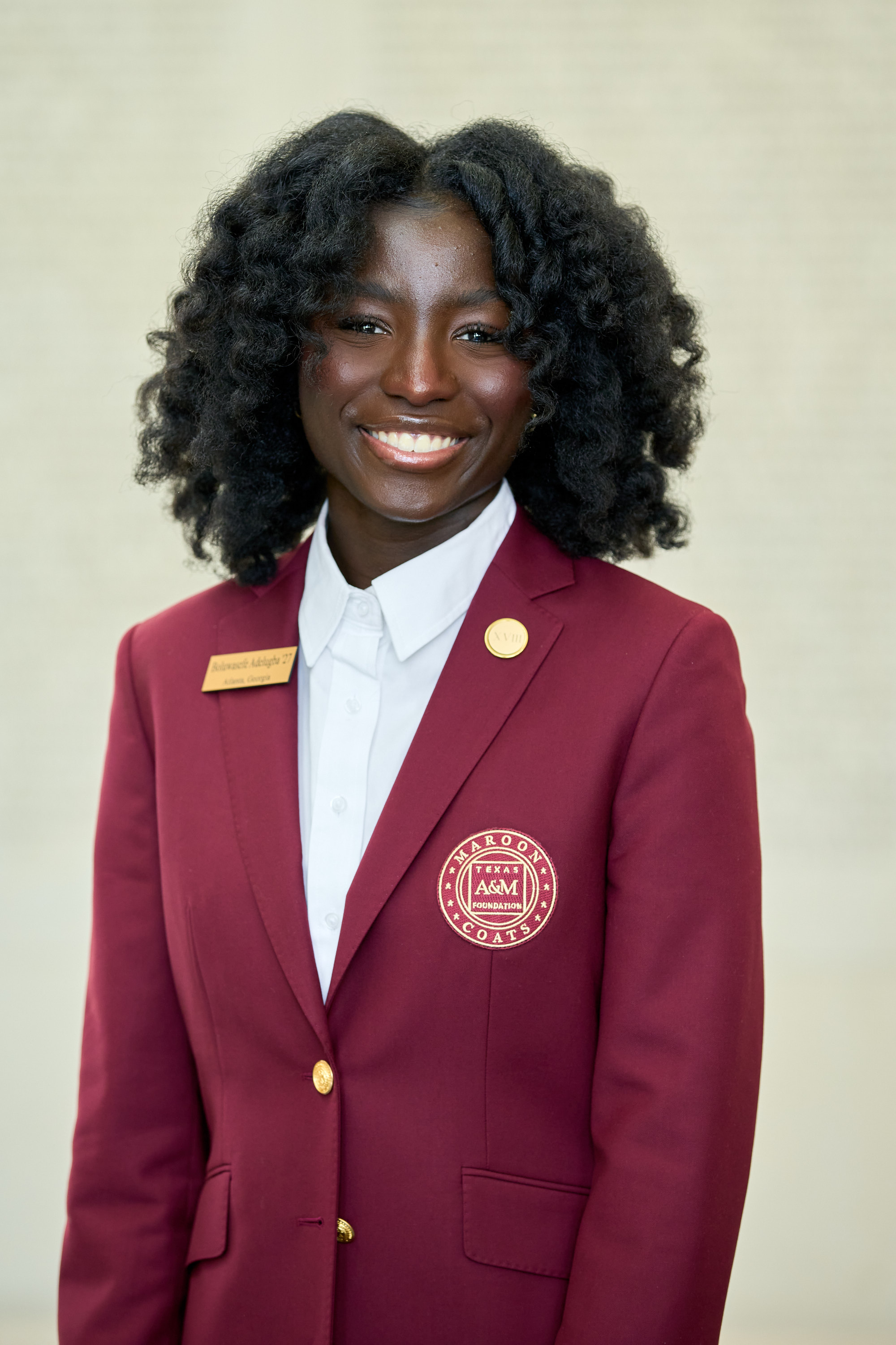 Maroon coat staff image