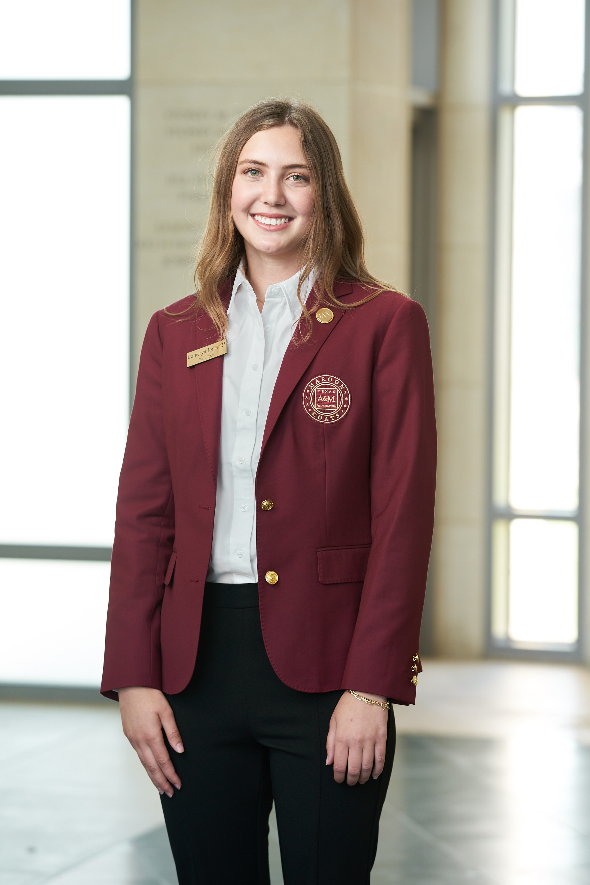 Maroon coat staff image