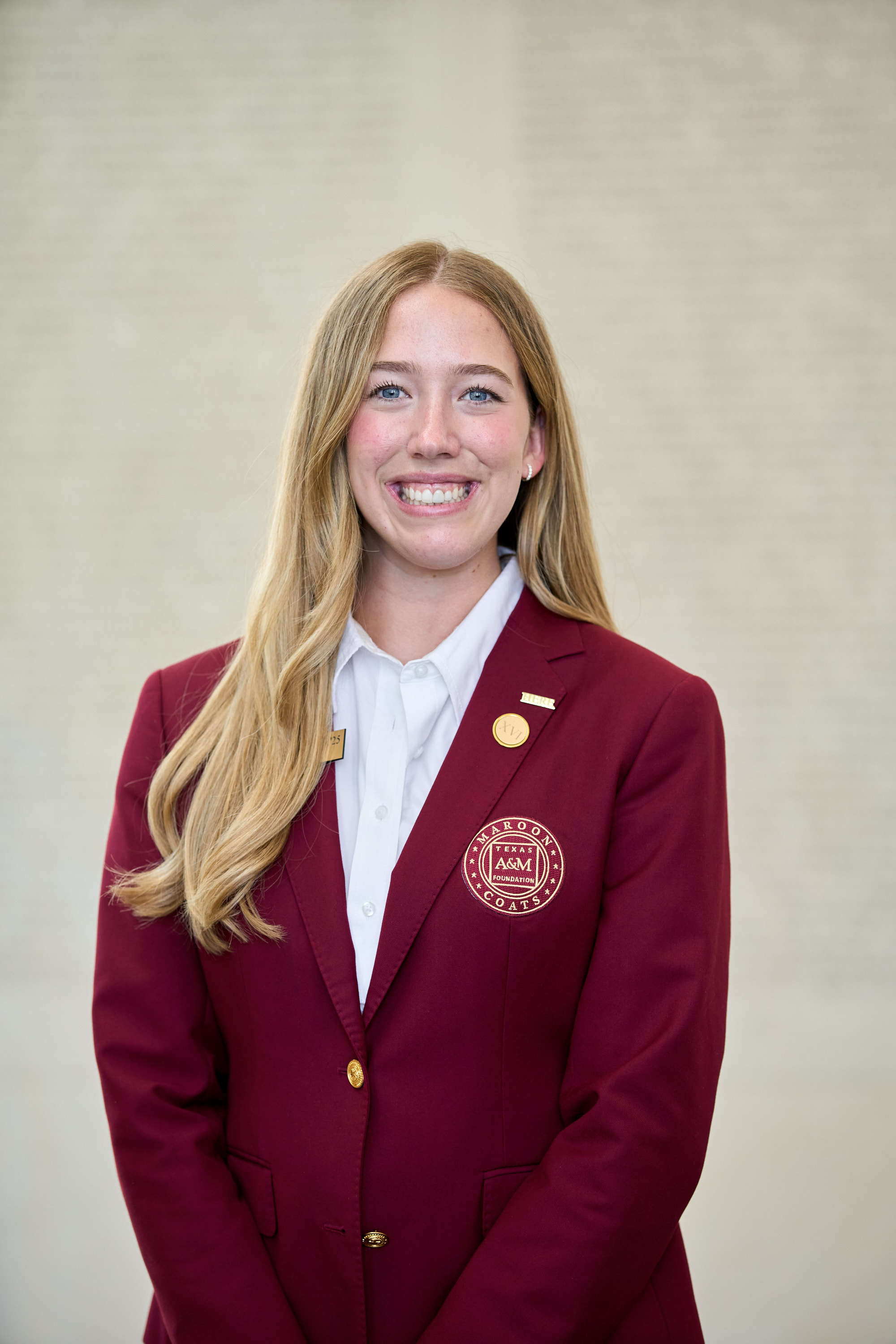 Maroon coat staff image