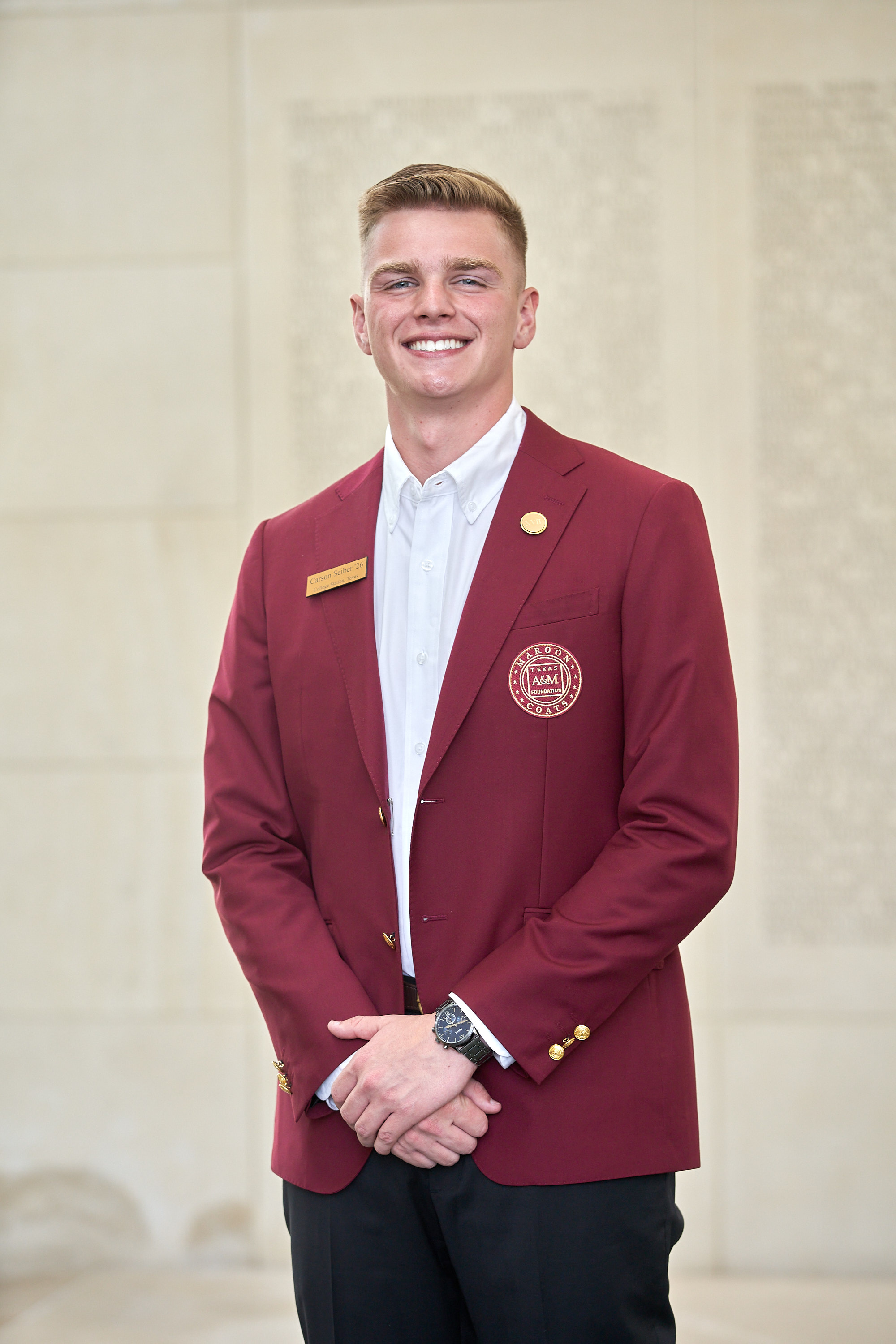 Maroon coat staff image