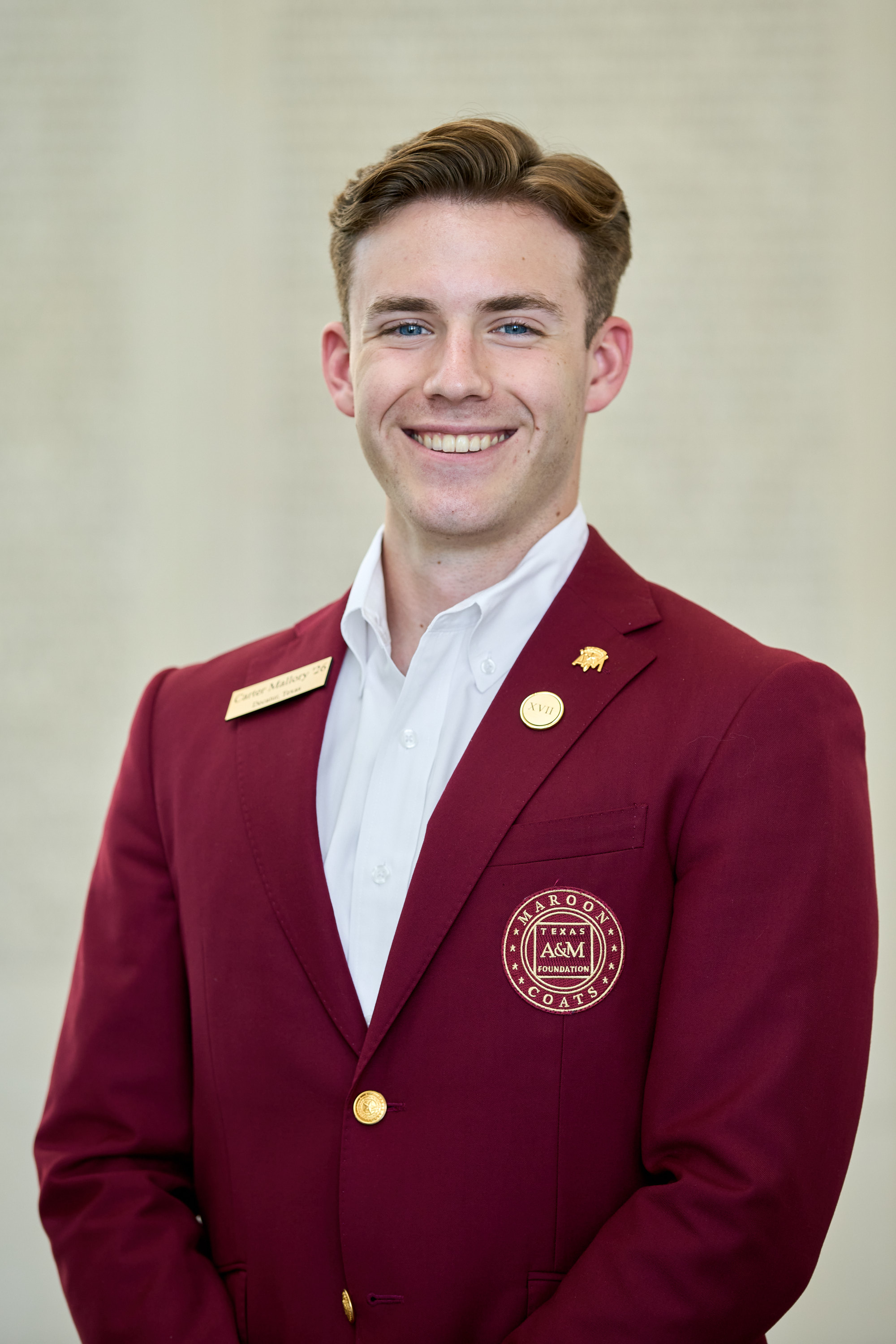 Maroon coat staff image