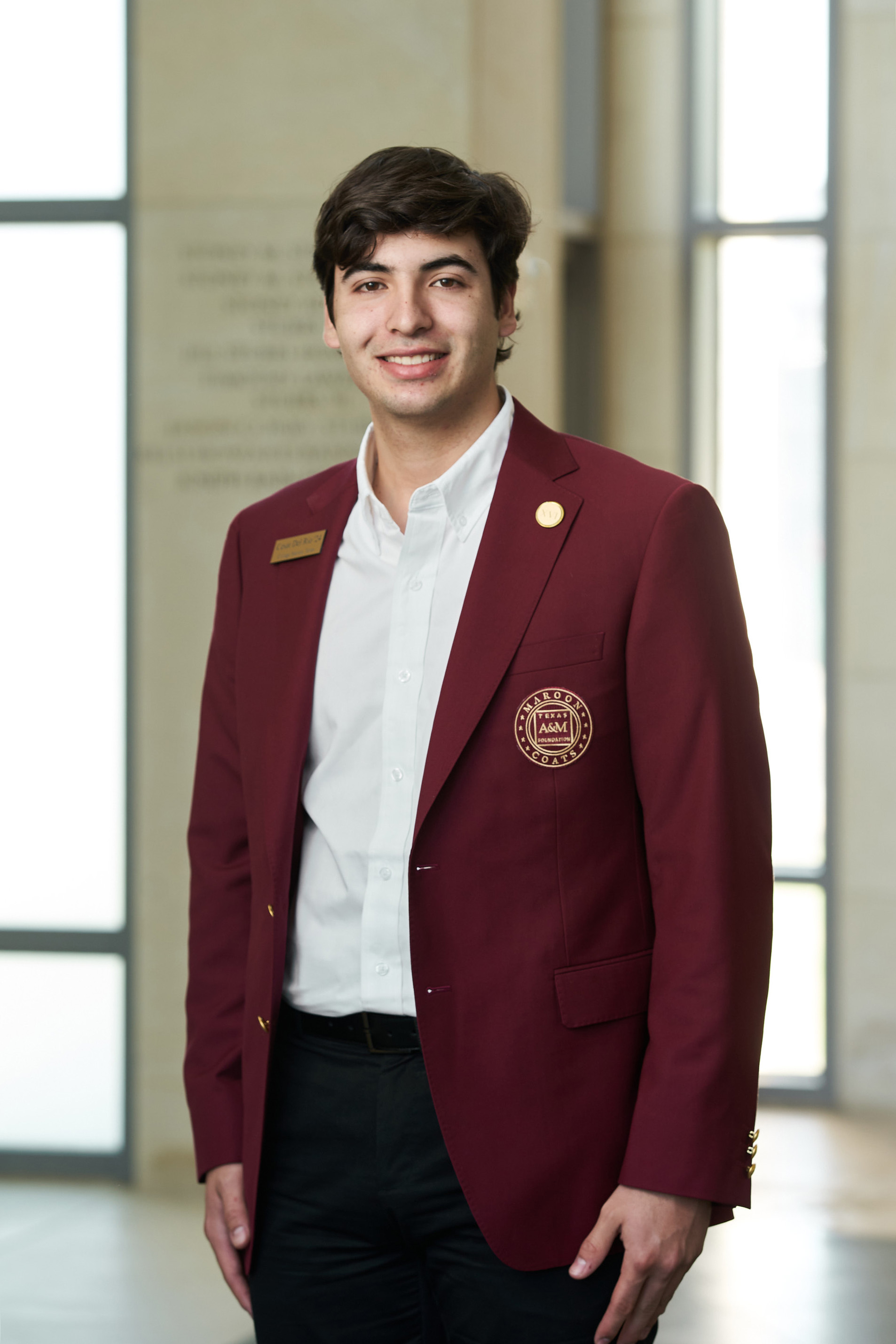 Maroon coat staff image