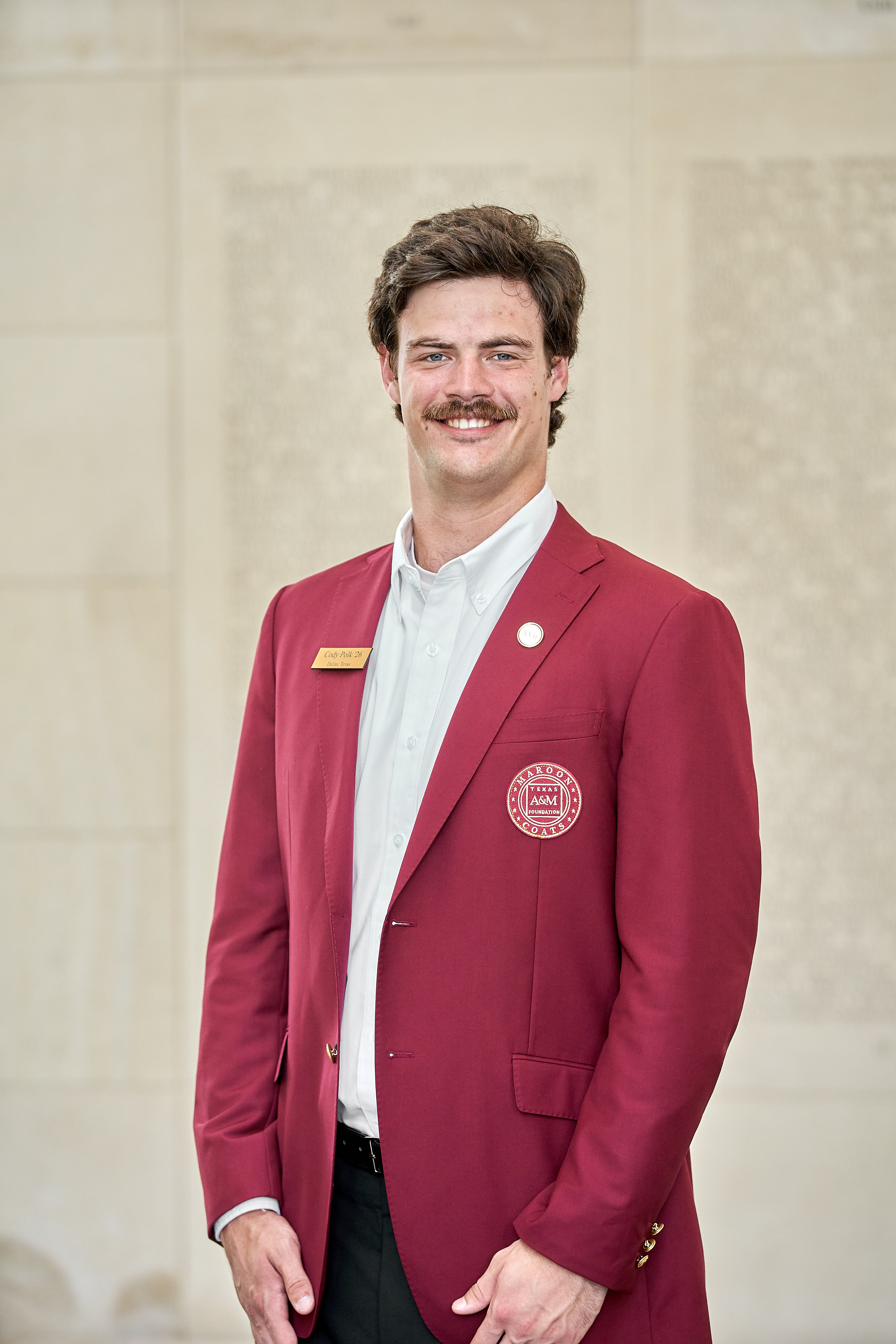 Maroon coat staff image