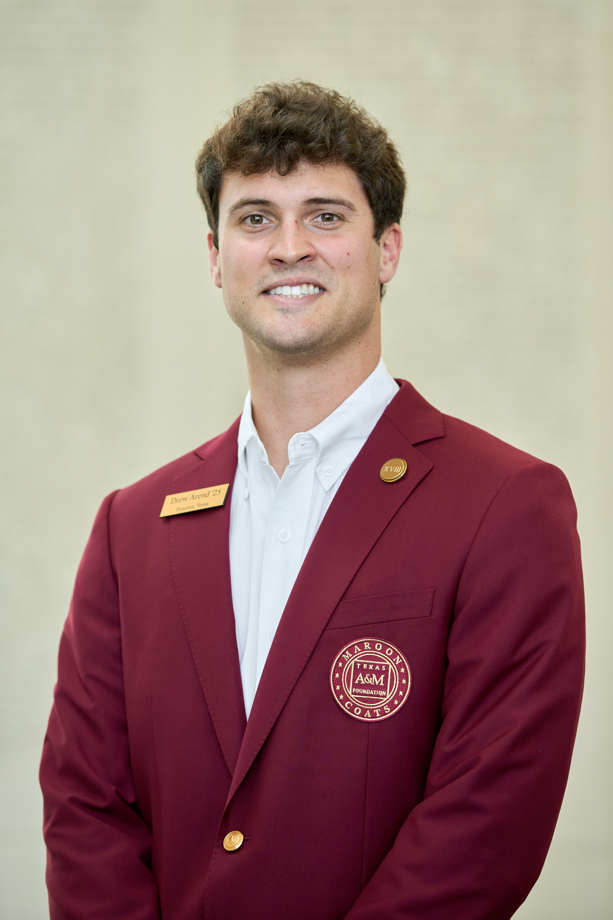 Maroon coat staff image