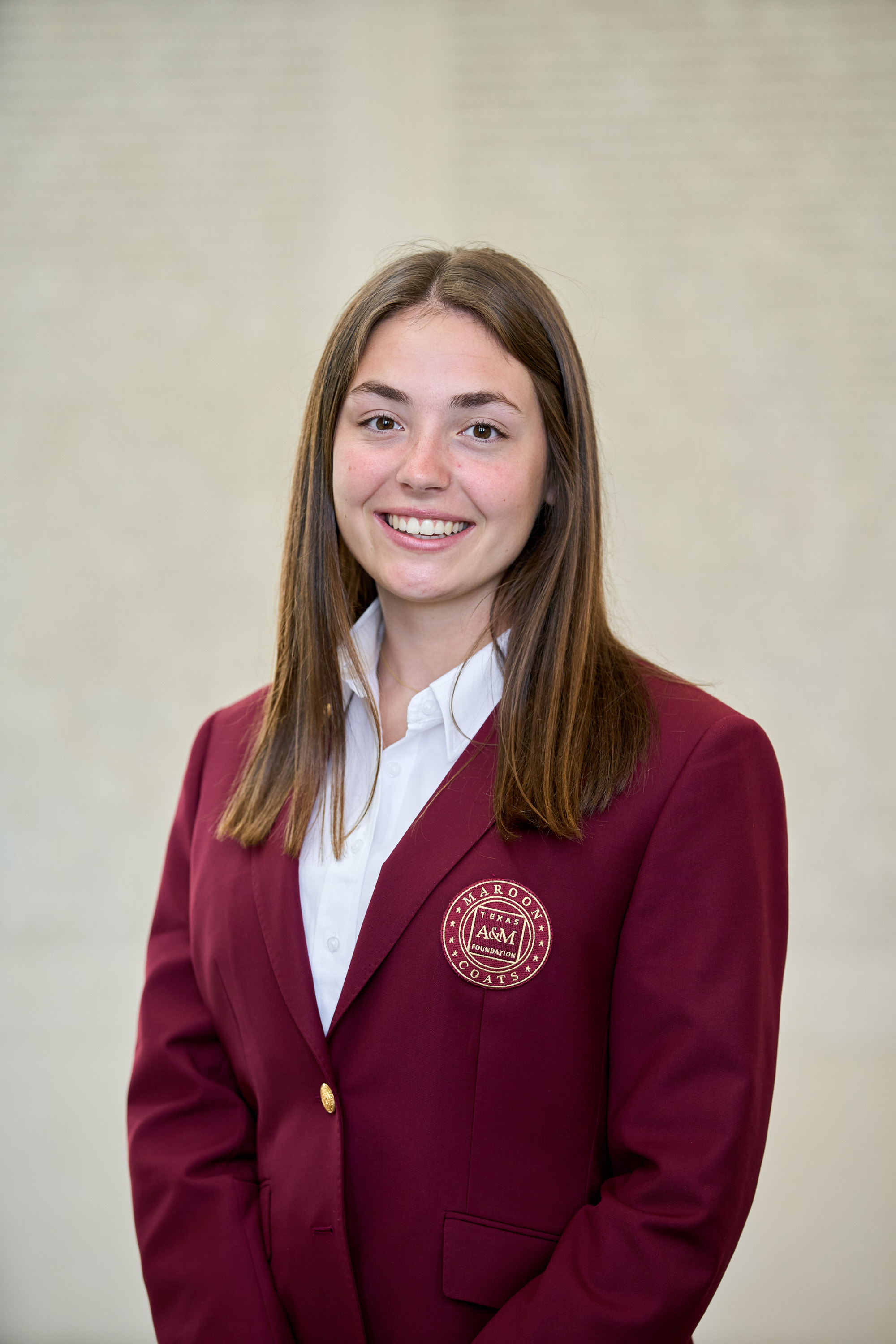 Maroon coat staff image