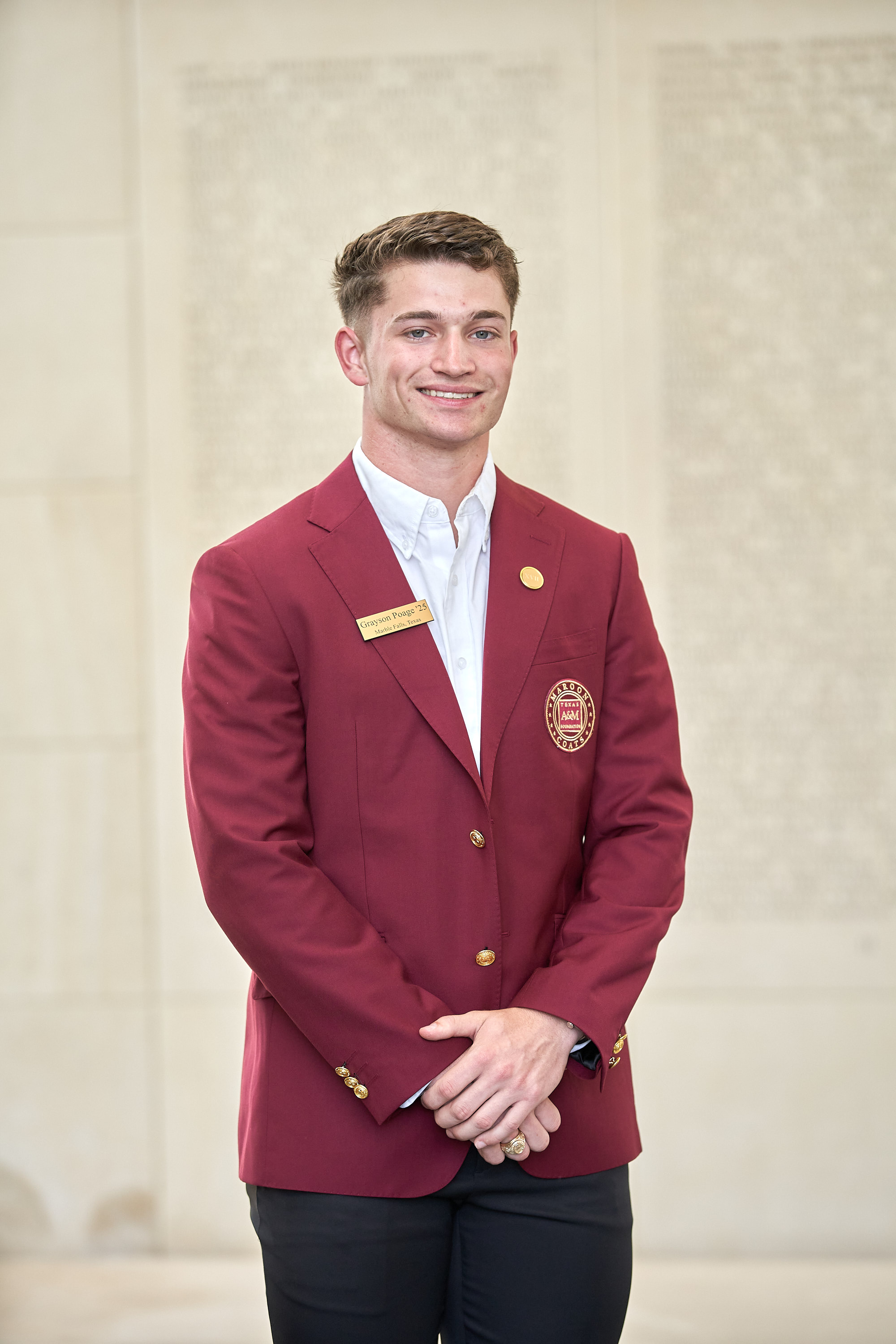 Maroon coat staff image