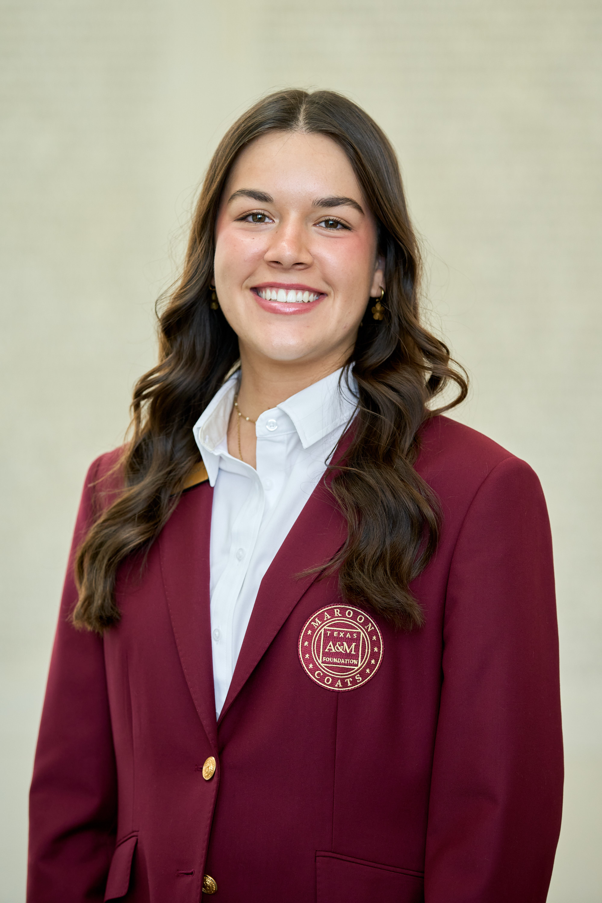 Maroon coat staff image