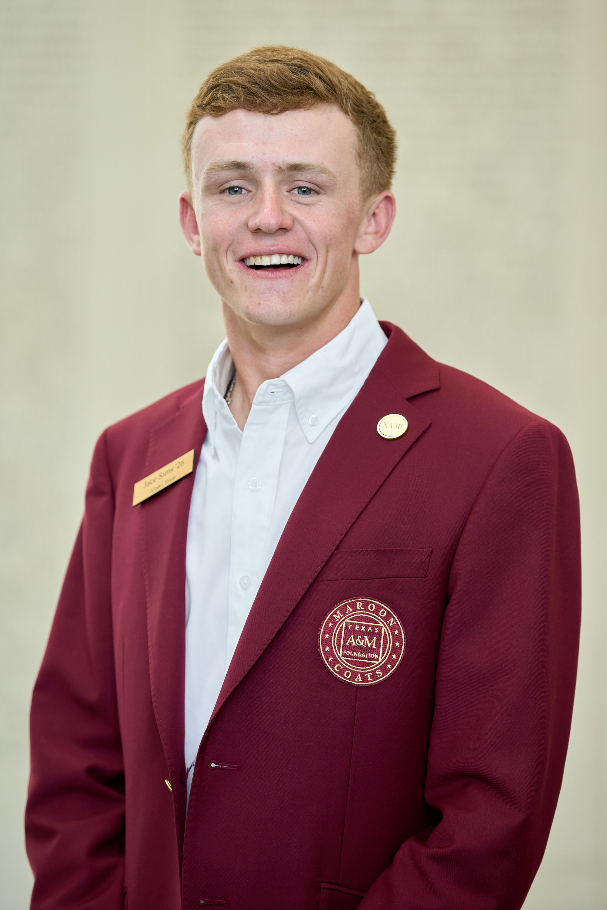 Maroon coat staff image