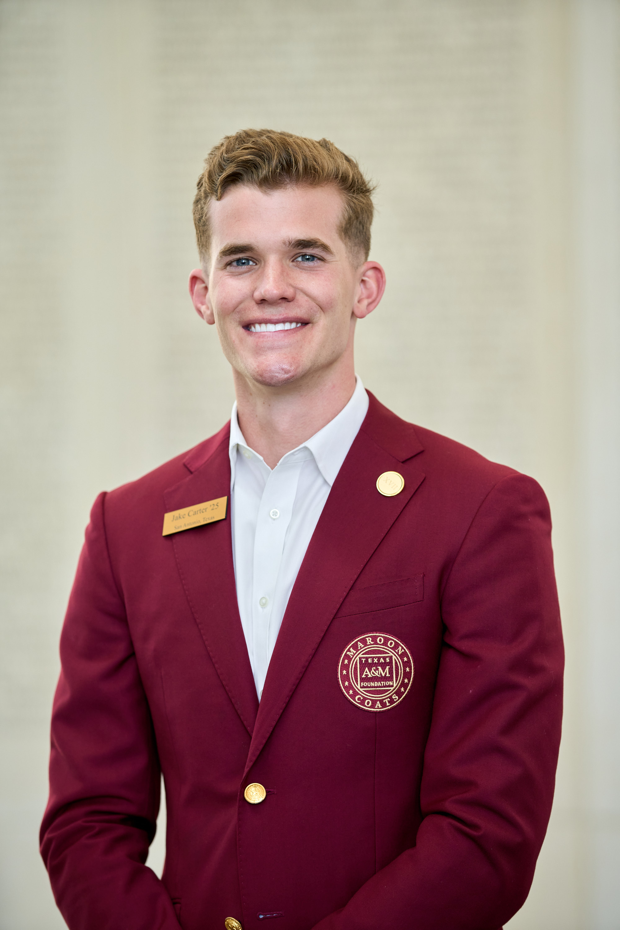 Maroon coat staff image