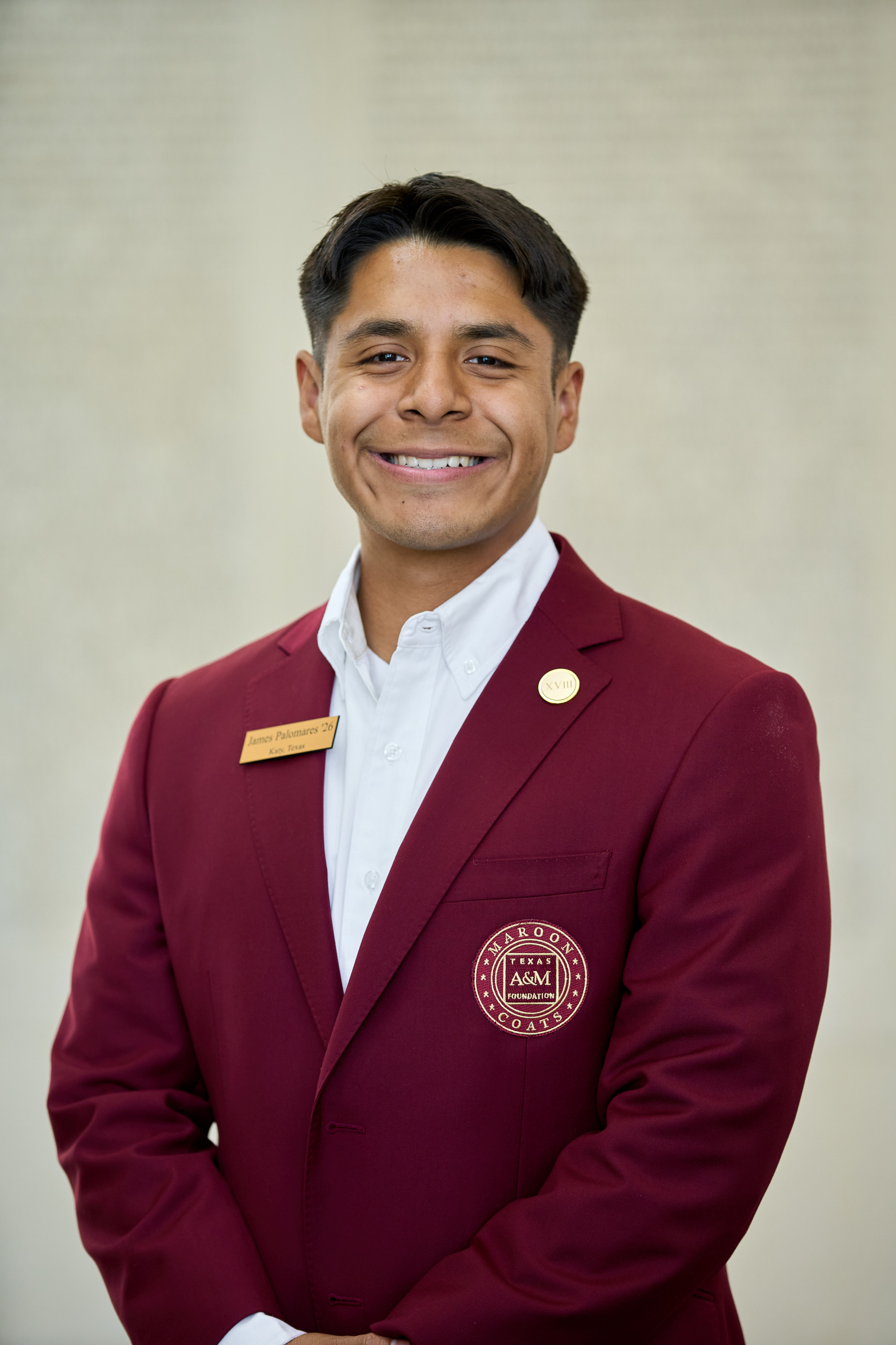 Maroon coat staff image