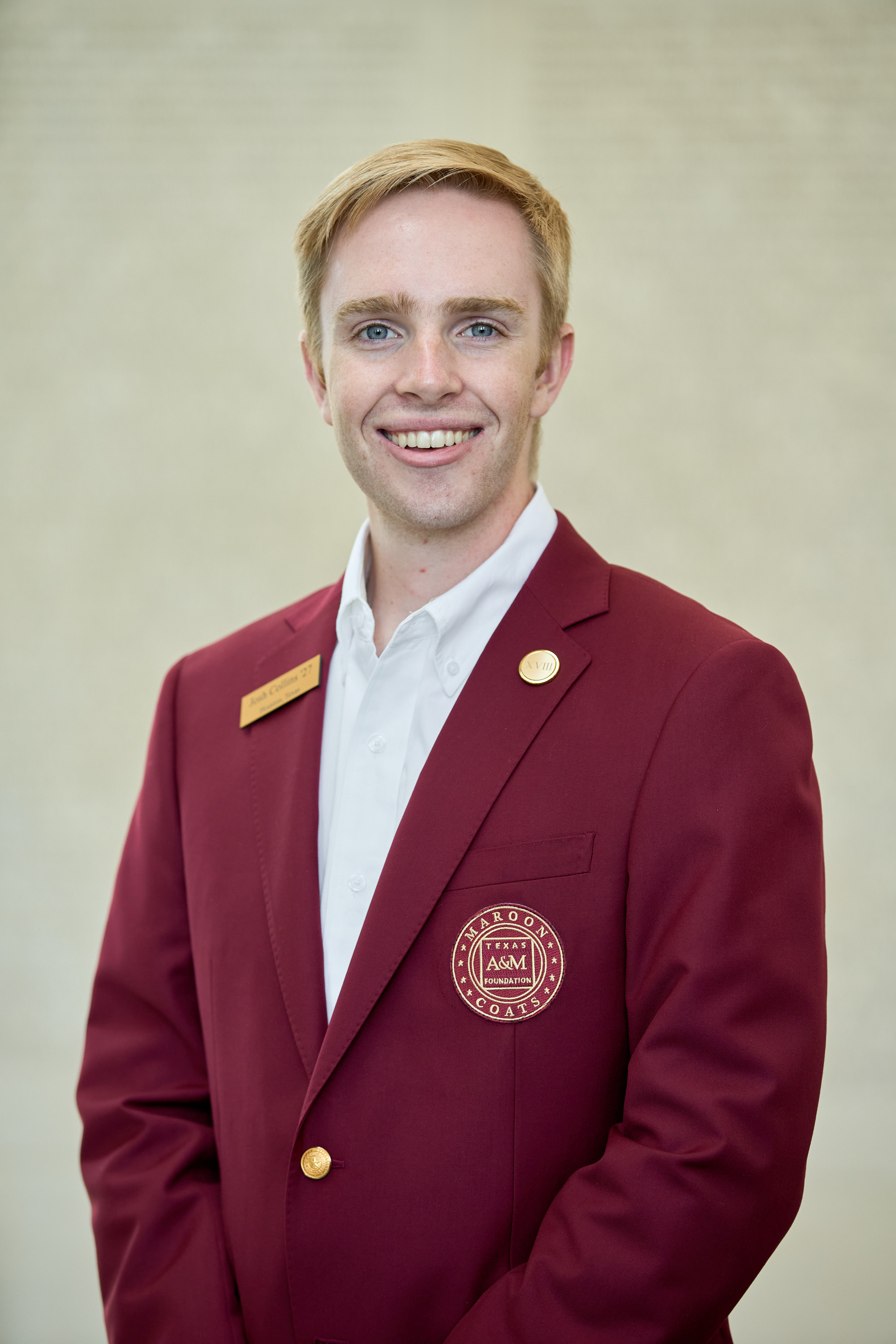 Maroon coat staff image