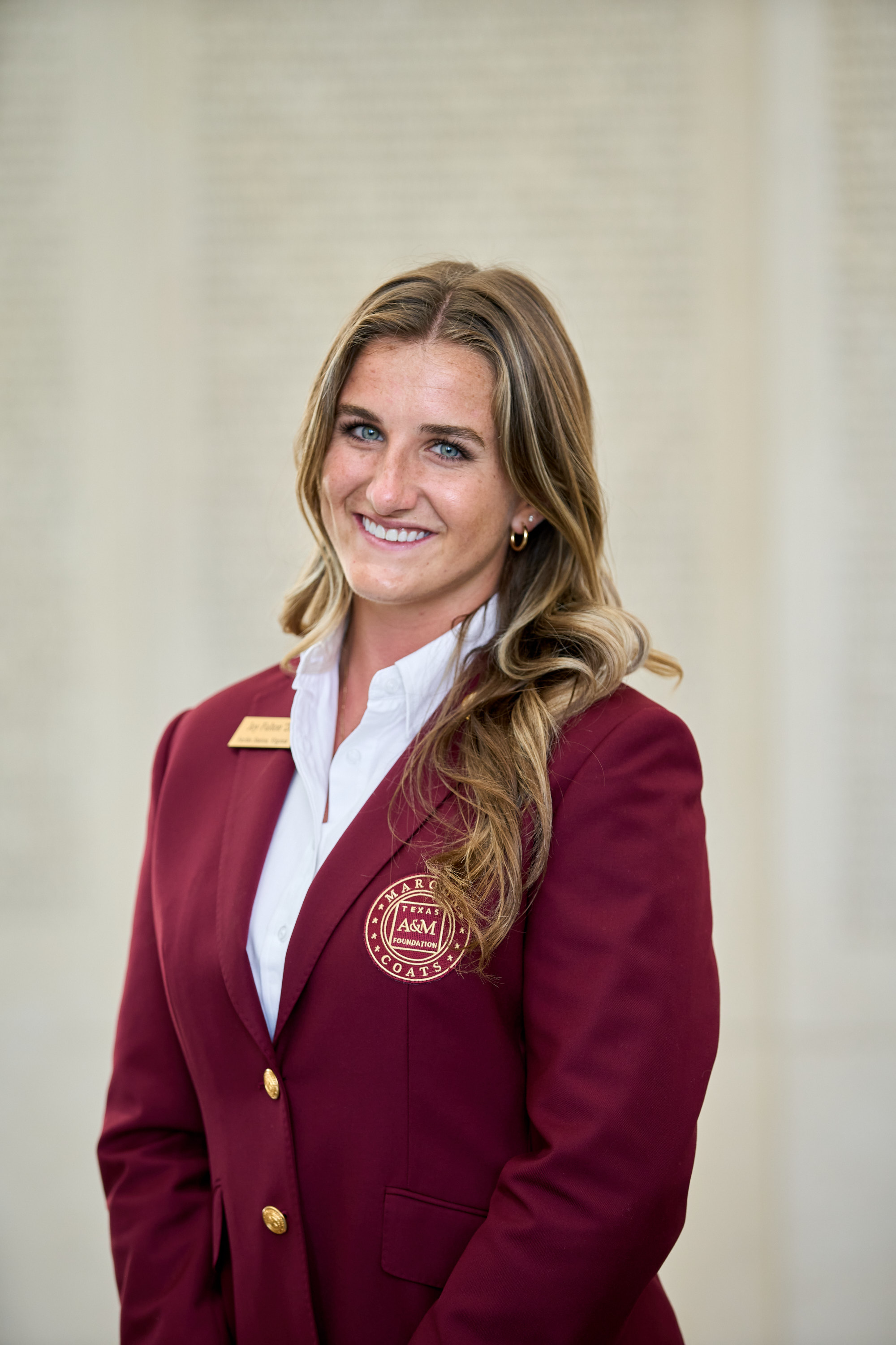 Maroon coat staff image