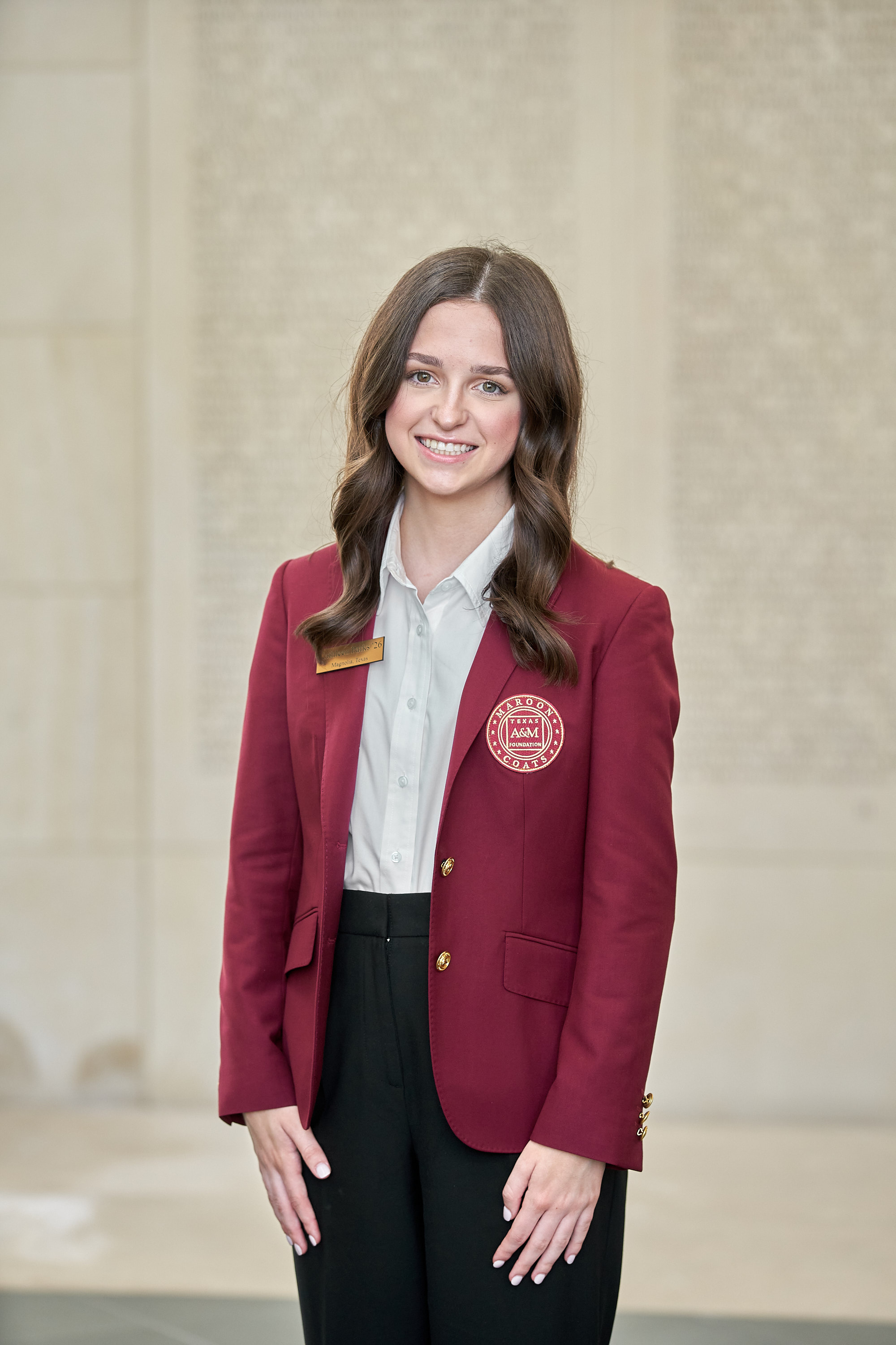 Maroon coat staff image