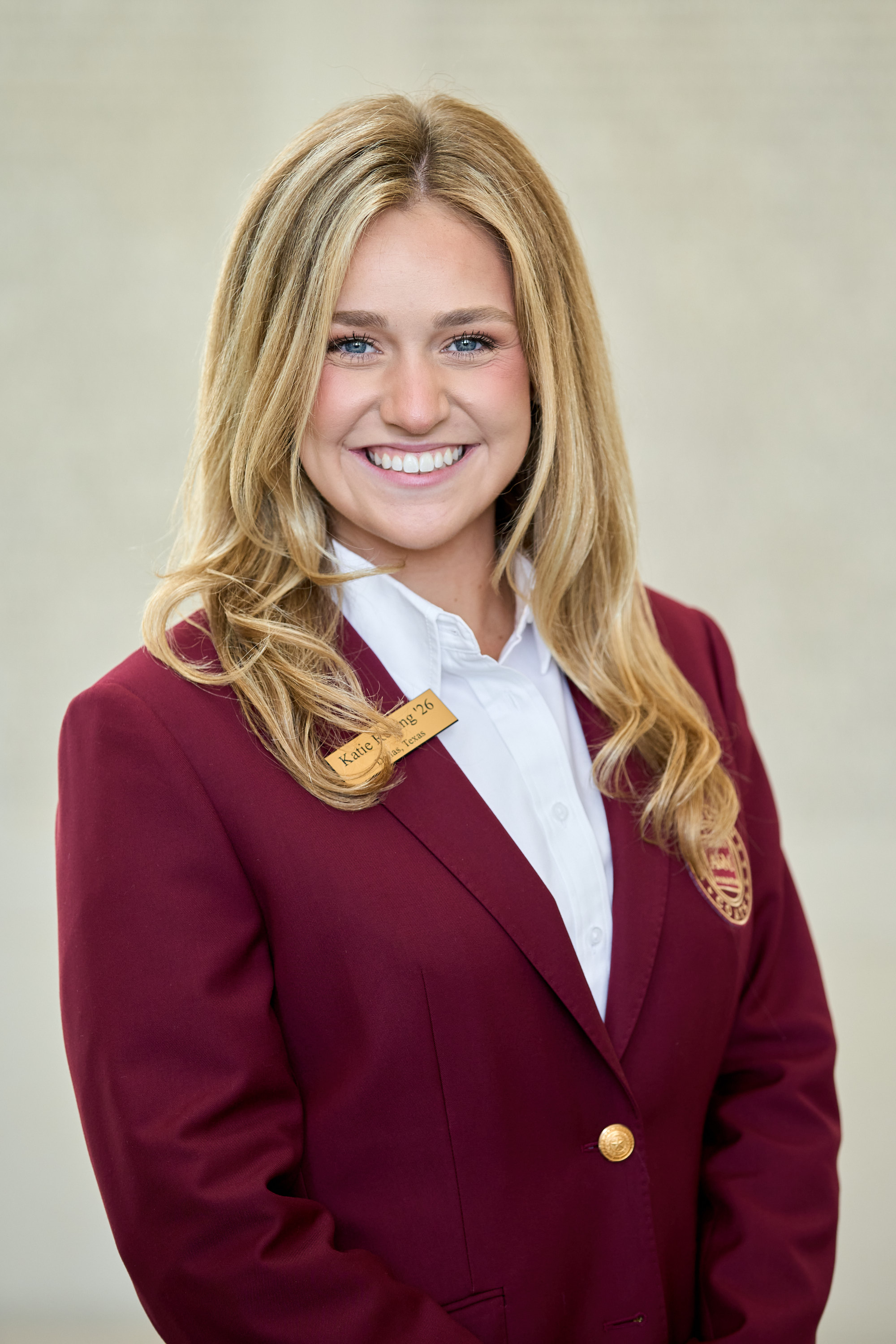 Maroon coat staff image