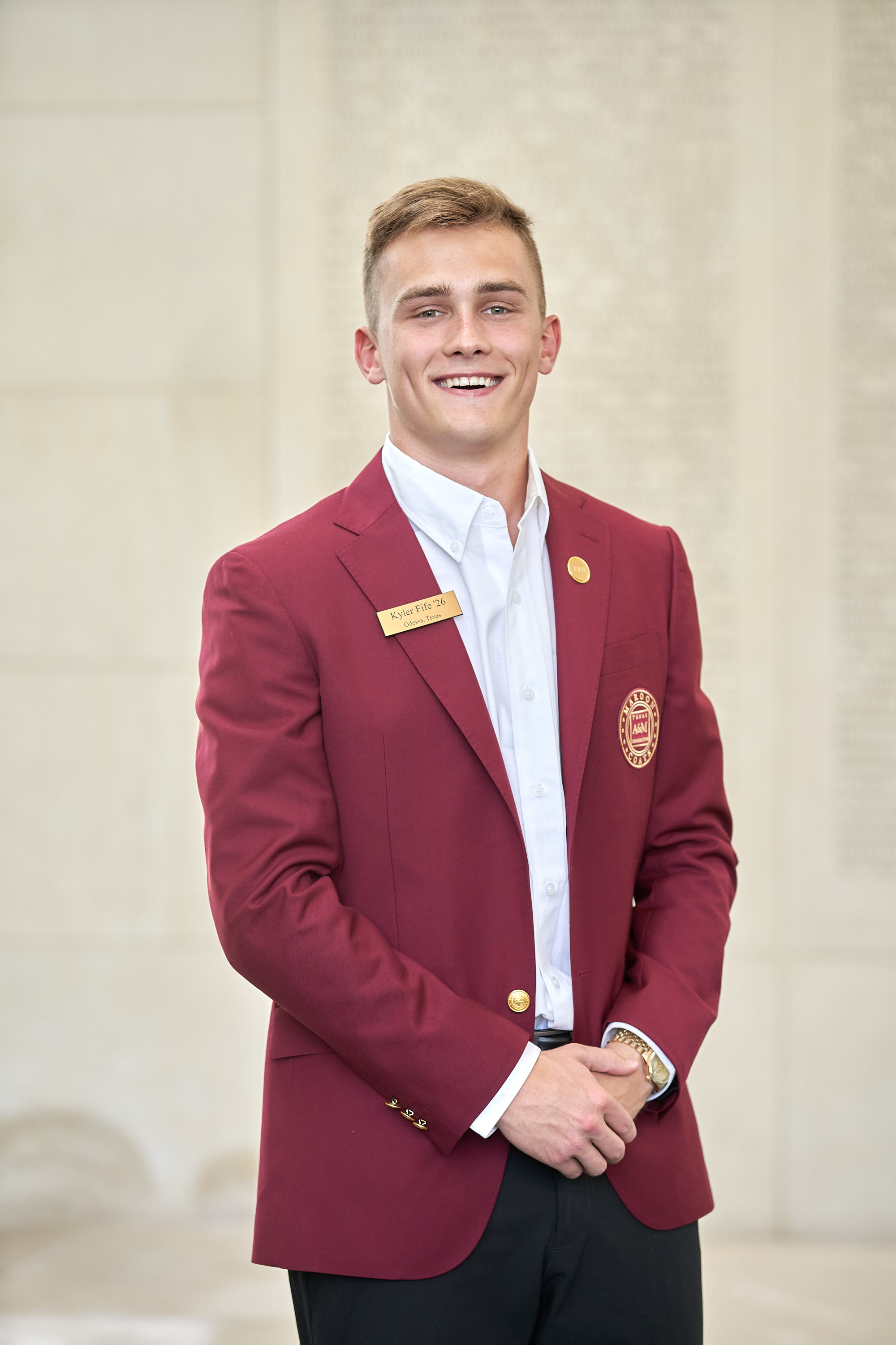 Maroon coat staff image
