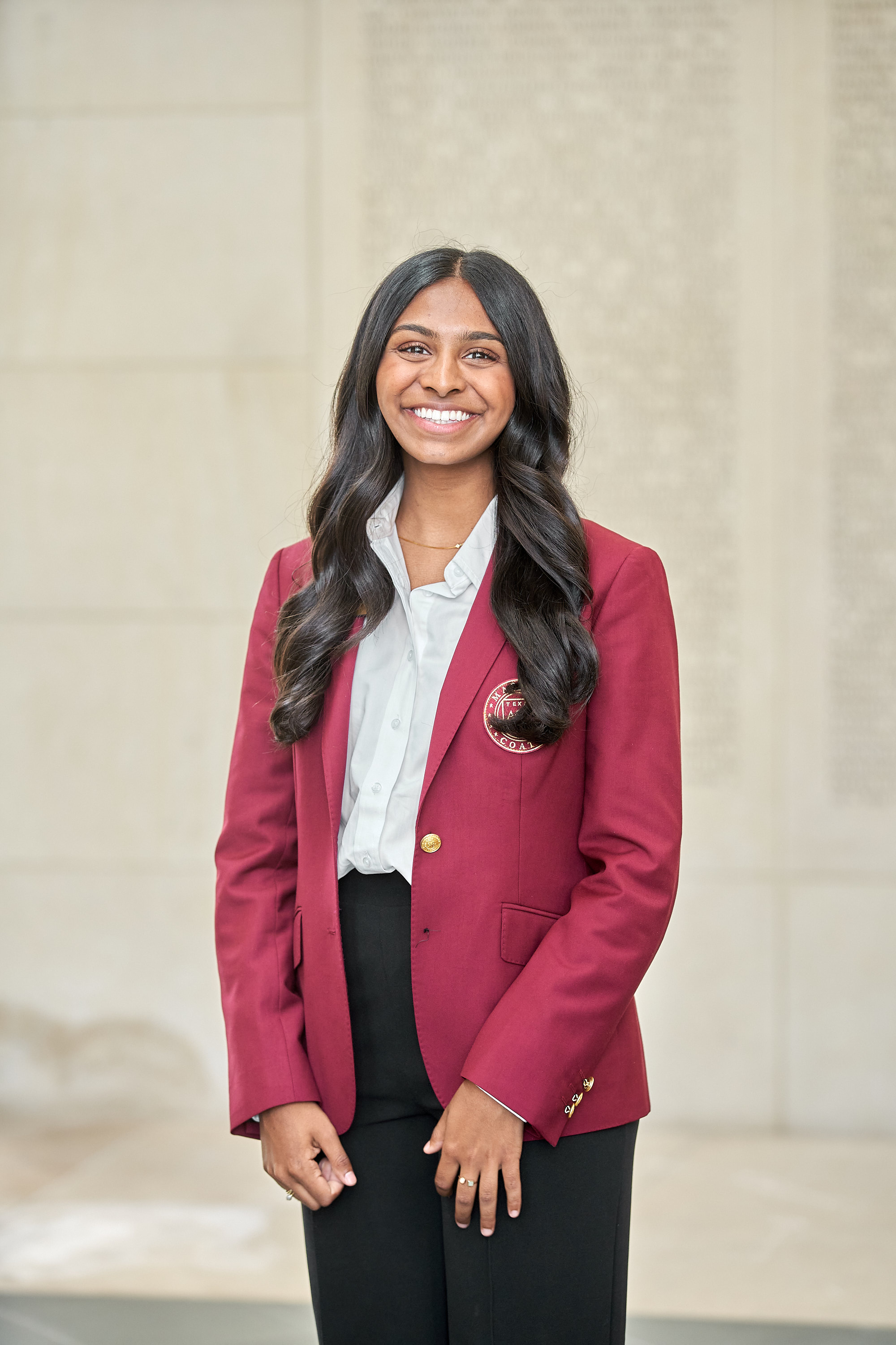Maroon coat staff image
