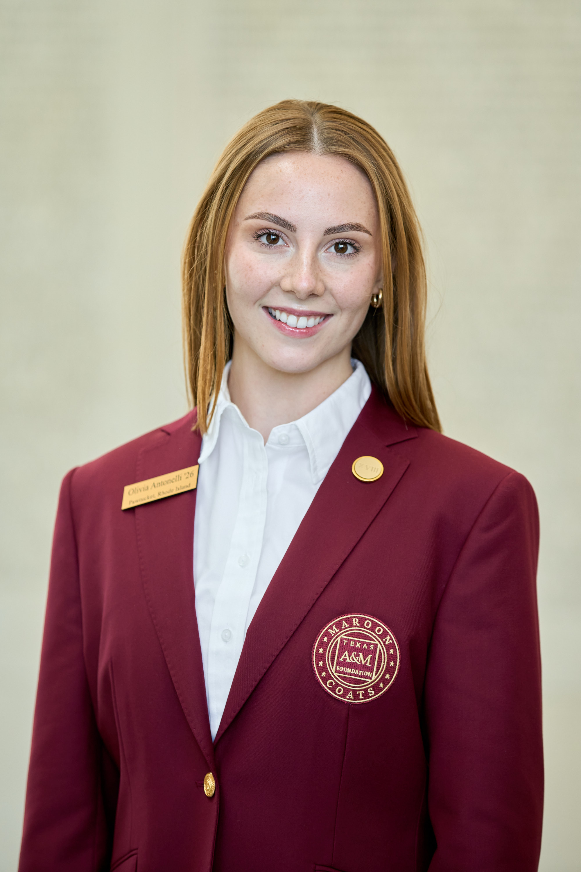 Maroon coat staff image