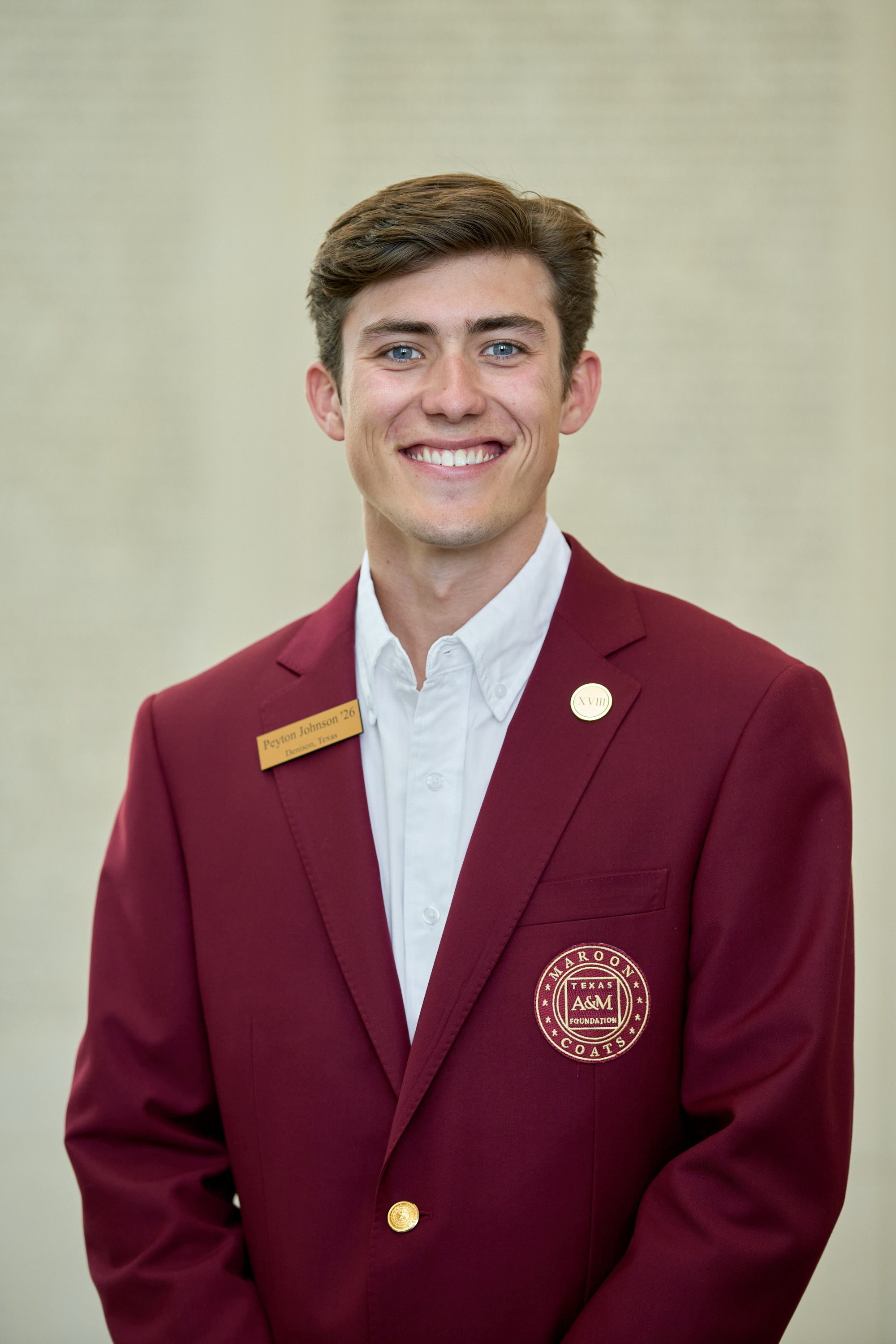 Maroon coat staff image