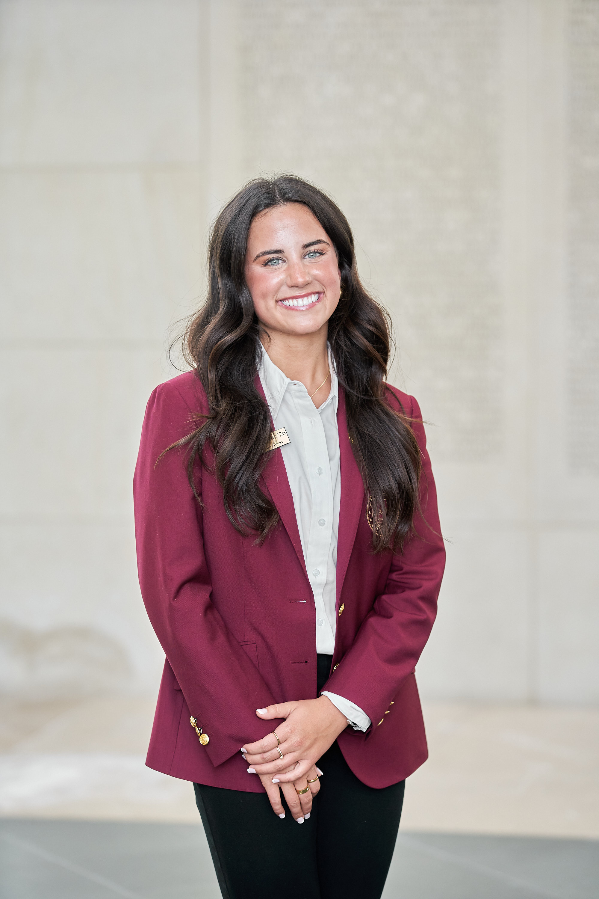 Maroon coat staff image