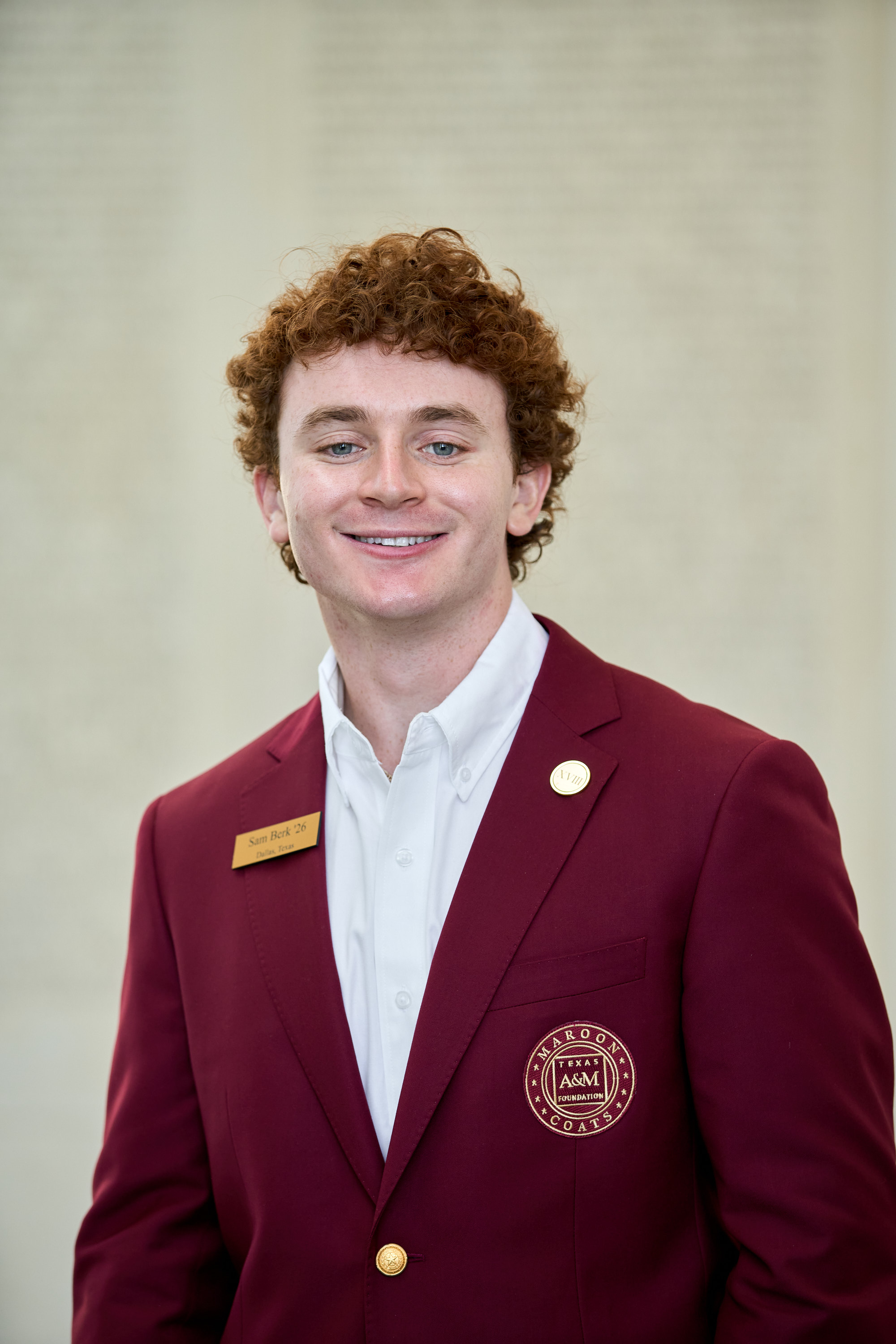 Maroon coat staff image