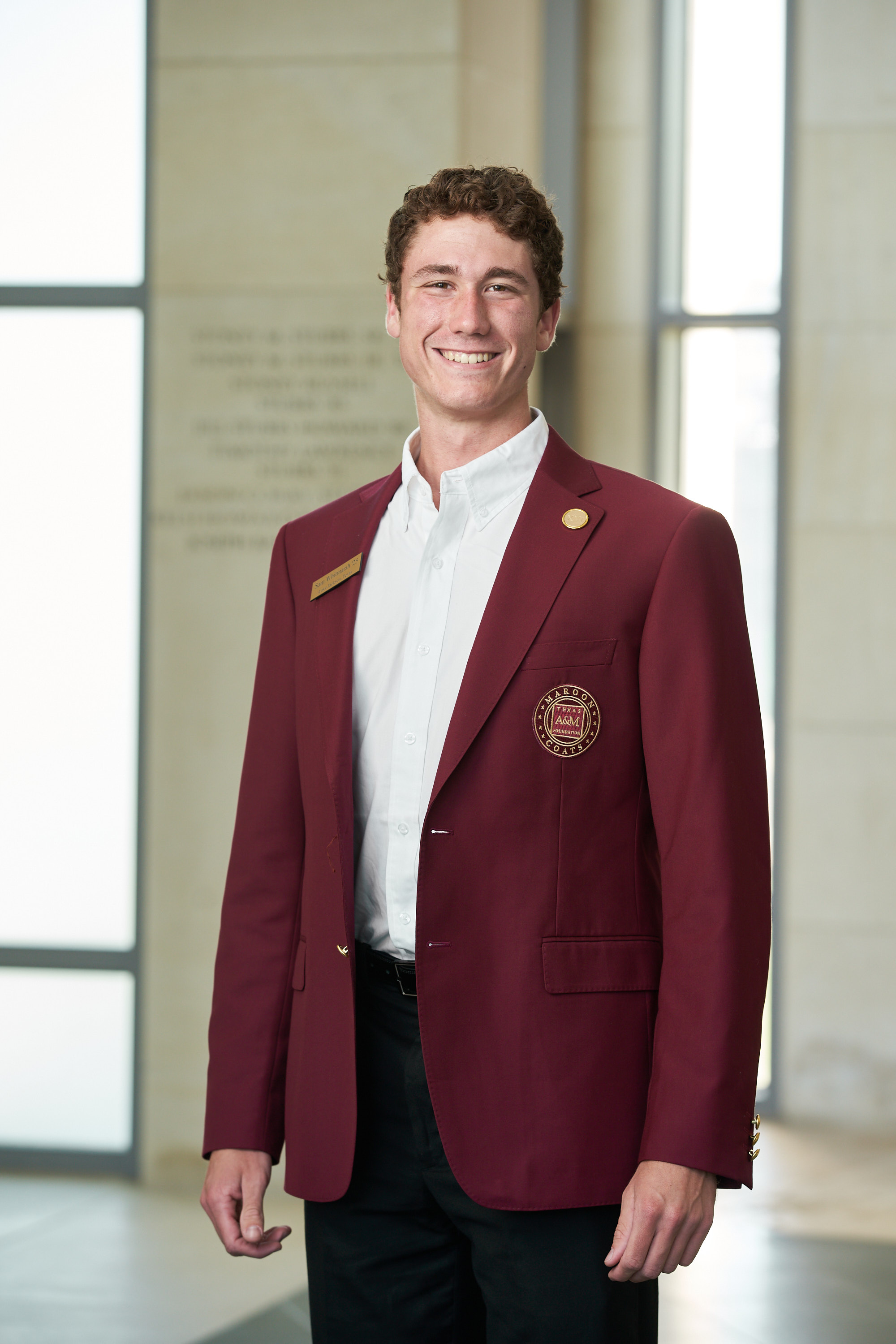 Maroon coat staff image