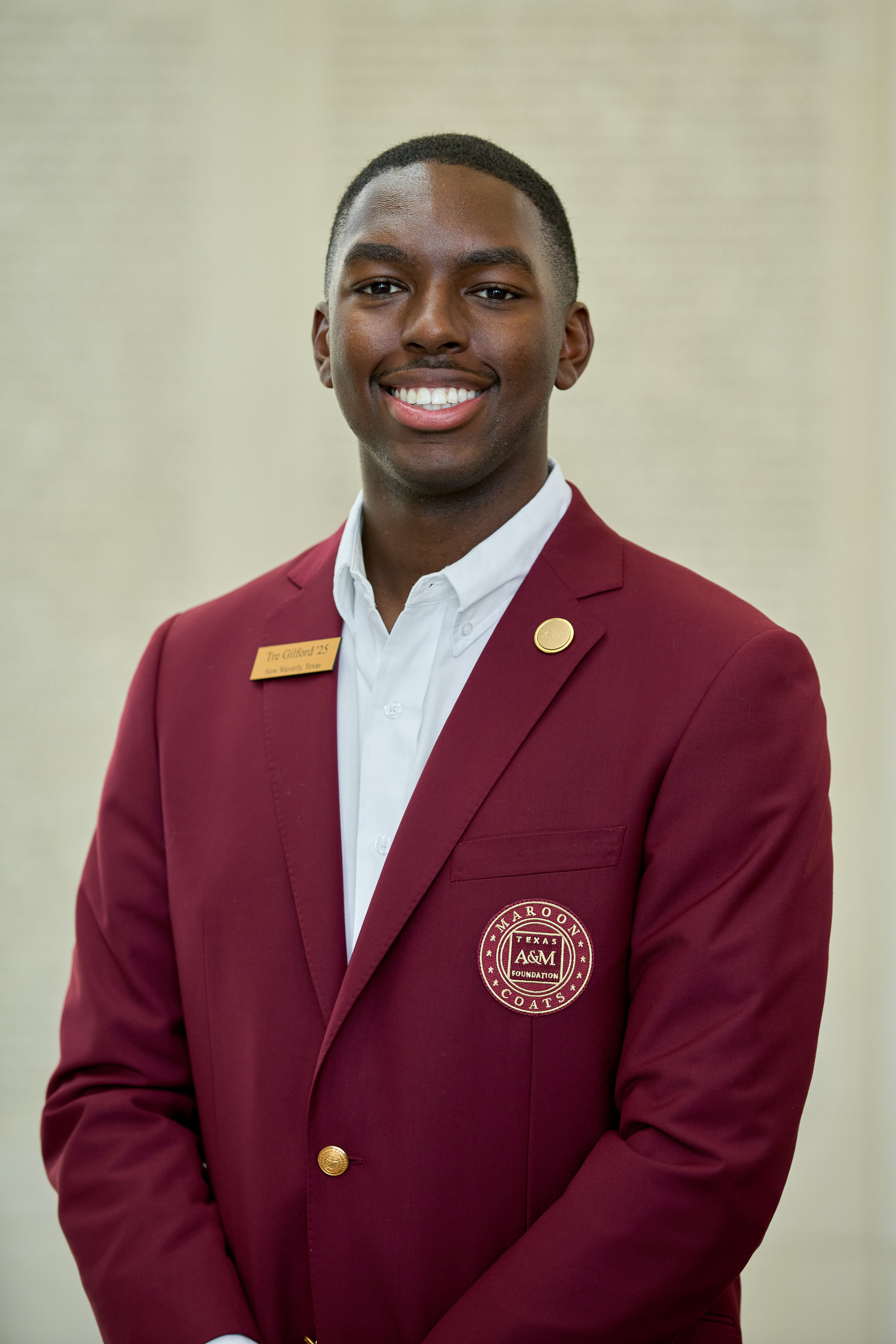 Maroon coat staff image