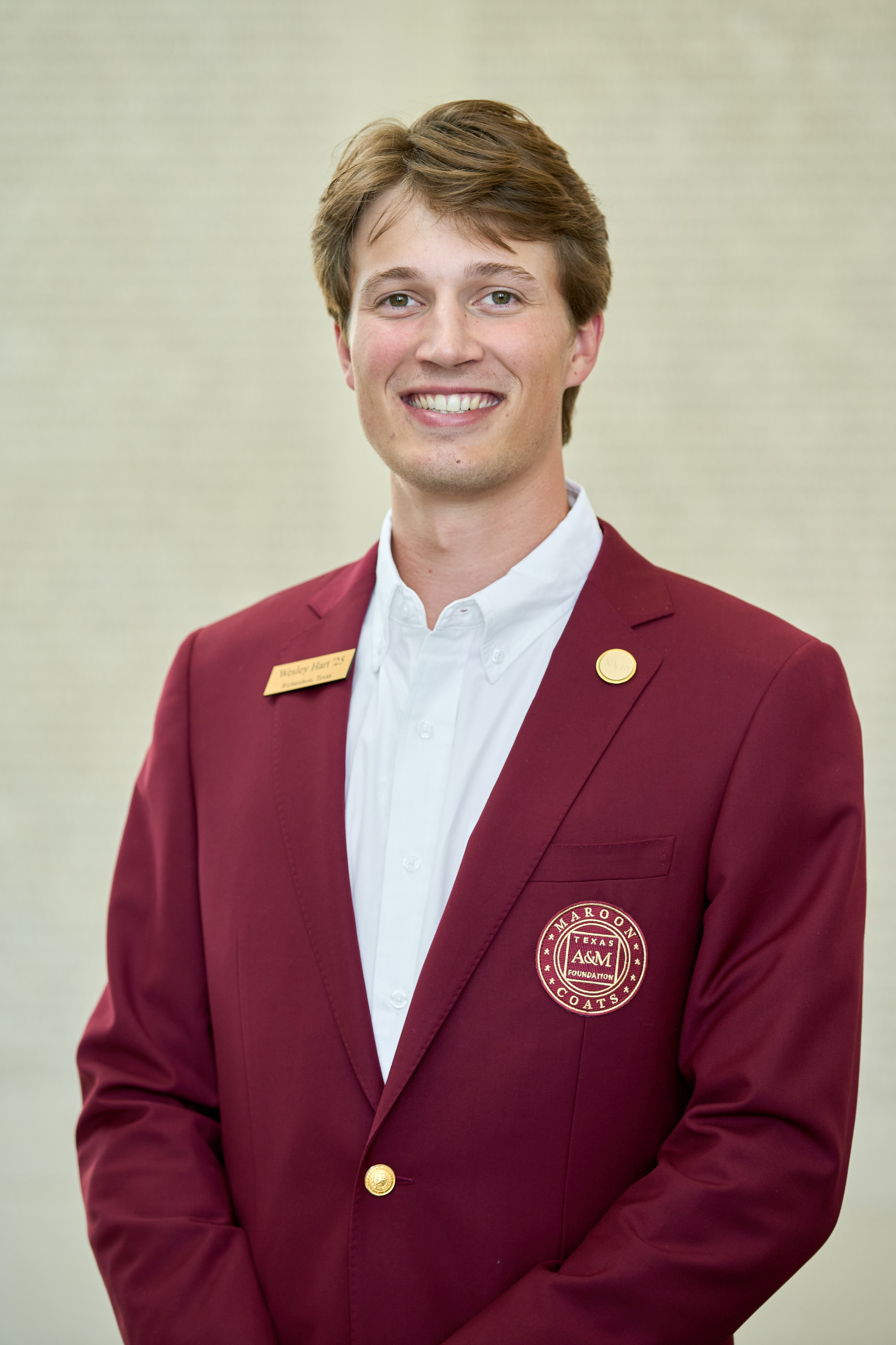 Maroon coat staff image